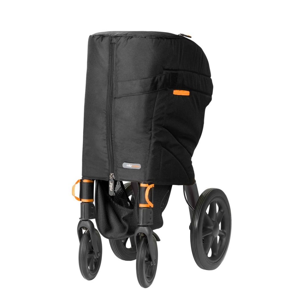 The Rollz Motion Rollator Accessories include a black, stroller-like pet carrier on four wheels, boasting an enclosed fabric section with a zippered top. With orange accents and harnesses, it provides a travel cover for small pets, ensuring mobility and security like a Wheelchair Package.